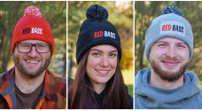 Winter knitted beanie with pom-pom REDBASS with a patch