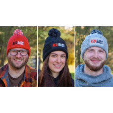 Winter knitted beanie with pom-pom REDBASS with a patch