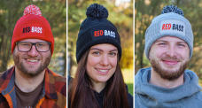 Winter knitted beanie with pom-pom REDBASS with a patch