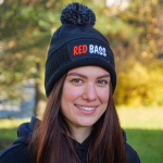 Winter knitted beanie with pom-pom REDBASS with a patch